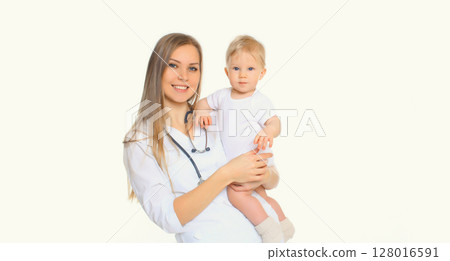 Happy smiling young woman doctor pediatrician holding little baby on white background 128016591