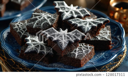 Dark Chocolate Halloween Brownies with Bat and Spiderweb Decorations 128017311