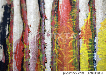 Thick Textured Lined Dirty Dried Scraped Paint in Different Colours Graffiti Overlap Cardboard Background 128019831
