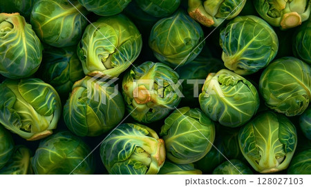 A of jeweltoned brussels sprouts tightly packed together with their unique leaflike layers on full display 128027103