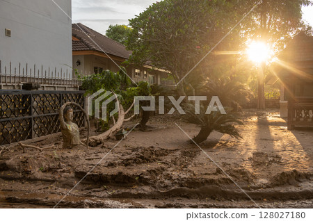 The local angel statue having damaged from mud and water flooding after typhoon Yagi swept across Thailand. 128027180