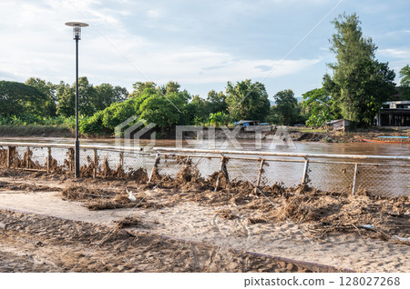The public park close to Kok river having damaged from Kok river rising and flooded Chiang Rai province, Thailand. The public park close to Kok river having damaged from Kok river rising and flooded Chiang Rai province, Thailand. 128027268