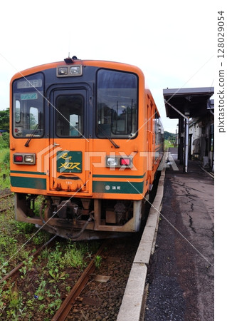 Tsugaru 21 series diesel railcar parked at Tsugaru-Nakasato Station, the terminal station of the Tsugaru Railway Tsugaru 21 series diesel railcar parked at Tsugaru-Nakasato Station, the terminal station of the Tsugaru Railway 128029054