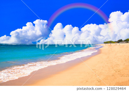 A rainbow over a beautiful beach in Bali 128029464