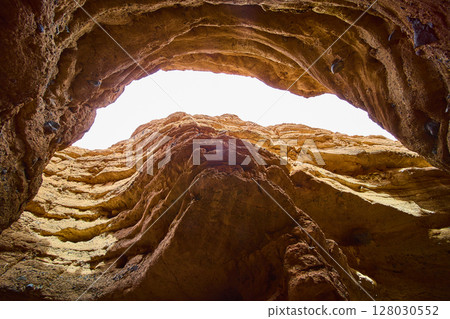Owl Canyon Rock Layers and Sky from Low Angle Perspective Owl Canyon Rock Layers and Sky from Low Angle Perspective 128030552