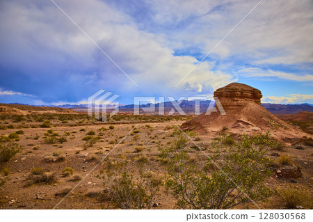 Desert Mesa and Distant Mountains with Dynamic Sky at Eye Level 128030568