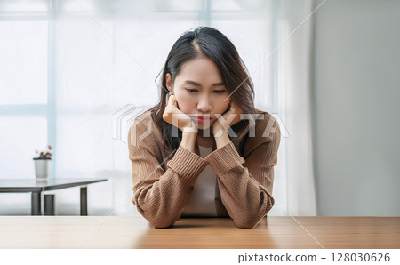 Woman indulging in wisdom Woman indulging in wisdom 128030626