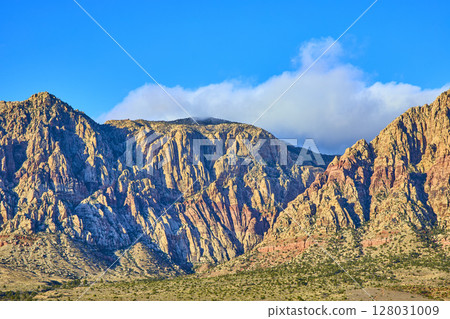 Rugged Red Rock Mountains Sunlit Layers Eye-Level Perspective 128031009