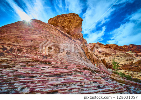 Red Rock Canyon Desert Layers and Sunburst Low Angle View Red Rock Canyon Desert Layers and Sunburst Low Angle View 128031057