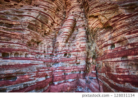 Vibrant Red Rock Layers with Sparse Shrub in Calico Nevada Eye-Level View 128031134