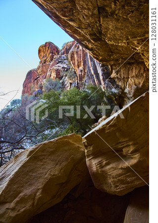 Red Rock Cliffs and Foliage in Lost Creek Canyon from Rocky Overhang Perspective Red Rock Cliffs and Foliage in Lost Creek Canyon from Rocky Overhang Perspective 128031161