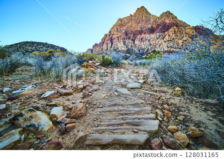 Red Rock Canyon Desert Pathway with Airplane Contrail in Sky Perspective Red Rock Canyon Desert Pathway with Airplane Contrail in Sky Perspective 128031165