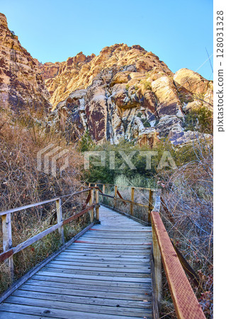 Pathway to Red Rock Nevada's Sunlit Canyon Adventure Perspective Pathway to Red Rock Nevada's Sunlit Canyon Adventure Perspective 128031328