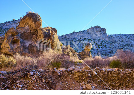 Rugged Rock Formations in Nevada Desert Eye-Level View Rugged Rock Formations in Nevada Desert Eye-Level View 128031341