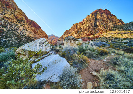 Red Rock Canyon Desert Trail at Golden Hour Eye-Level View 128031457