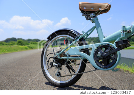 Leisure, outdoor season and cycling. Blue sky and nature background 128033427