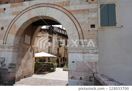 The Ponte Pietra is a Roman arch bridge crossing the Adige River in Verona, Italy. 128033700