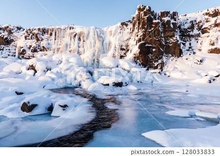 A the Oxararfoss waterfall in Thingvellir National Park 128033833