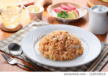 Fragrant cod roe fried rice - Japanese-style fried rice with hot rice and spicy fish roe Fragrant cod roe fried rice - Japanese-style fried rice with hot rice and spicy fish roe 128034618