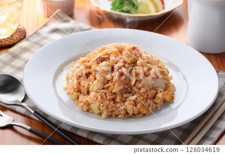 Fragrant cod roe fried rice - Japanese-style fried rice with hot rice and spicy fish roe Fragrant cod roe fried rice - Japanese-style fried rice with hot rice and spicy fish roe 128034619