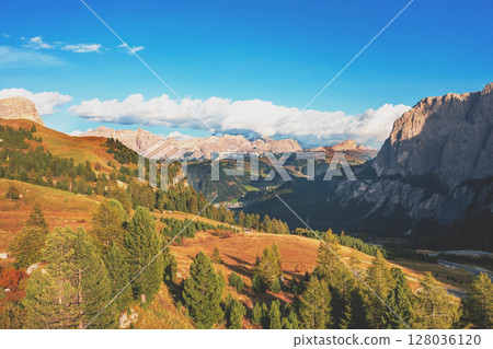 Mountain landscape background. Rocks against the sky. The Dolomites in South Tyrol, Bolzano, Italy Mountain landscape background. Rocks against the sky. The Dolomites in South Tyrol, Bolzano, Italy 128036120
