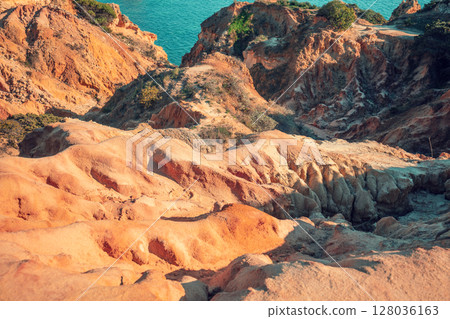 Rocky seascape in the Algarve region in the Atlantic Ocean, Portugal, Europe Rocky seascape in the Algarve region in the Atlantic Ocean, Portugal, Europe 128036163