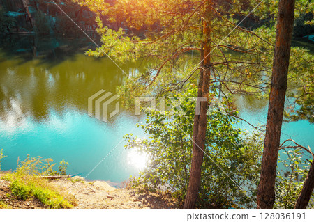 Beautiful lakeshore of mountain lake. Rural landscape in autumn. Wilderness, serenity lake Beautiful lakeshore of mountain lake. Rural landscape in autumn. Wilderness, serenity lake 128036191