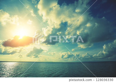 Seascape in the evening. Dramatic sunset over the sea. Nature landscape Seascape in the evening. Dramatic sunset over the sea. Nature landscape 128036330