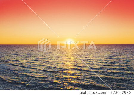 Seascape in the early morning. Sunrise over the sea. Natural landscape 128037980