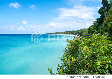 Turquoise waters at Bira Beach, Sulawesi, Indonesia coastline view 128038189
