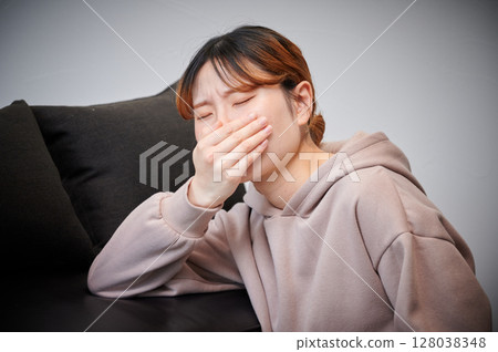 Women suffering from morning sickness, pregnant women, maternity Women suffering from morning sickness, pregnant women, maternity 128038348