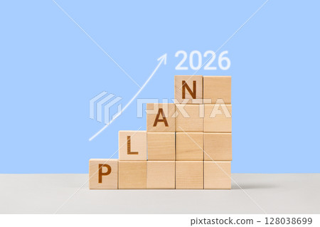 Wooden cubes with numbers 2026 are a symbol of success. Development to success, planning and motivation in 2026, challenge and business strategy in new year, business progress, development of company 128038699
