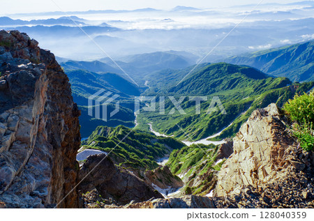 A town at the foot of Mt. Shirouma as seen from the top 128040359
