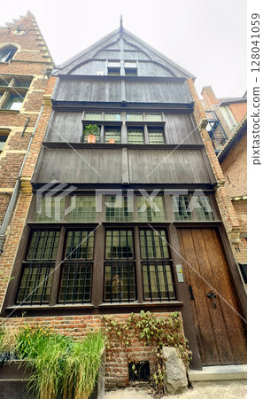 Antwerp, Antwerp, Belgium, April 18th, 2025, Charming and Historic Wooden House Surrounded by a 128041059