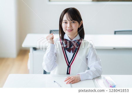 Students studying in classroom 128041853