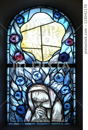 Stained glass window by Sieger Koder in chapel in Hutten, Germany Stained glass window by Sieger Koder in chapel in Hutten, Germany 128042170