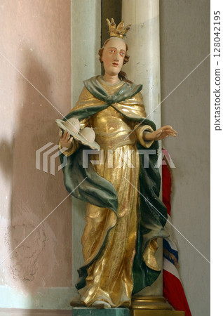 Saint Agatha of Sicily, statue on the Saint Elizabeth altar in the Church of the Three Kings in Komin, Croatia Saint Agatha of Sicily, statue on the Saint Elizabeth altar in the Church of the Three Kings in Komin, Croatia 128042195