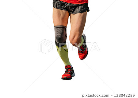 legs man runner running with knee pad protection cut-out figure on white background legs man runner running with knee pad protection cut-out figure on white background 128042289