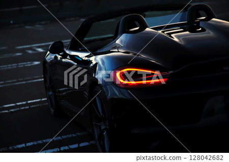 shiny black open car shiny black open car 128042682