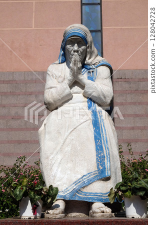 Mother Teresa statue in front of St Paul's Cathedral in Tirana, Albania Mother Teresa statue in front of St Paul's Cathedral in Tirana, Albania 128042728