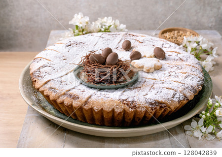 Easter Tart Pastiera Napolitano with Chocolate Nest Decoration 128042839