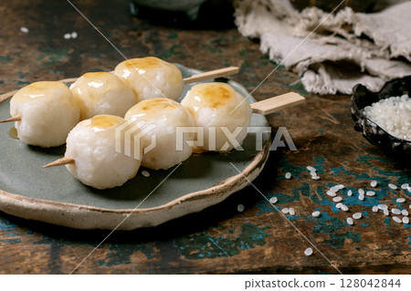 Traditional Japanese Dango Dumplings on Skewers Traditional Japanese Dango Dumplings on Skewers 128042844