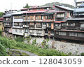 Nakasendo: Cliffside house construction on the Kiso River 128043059