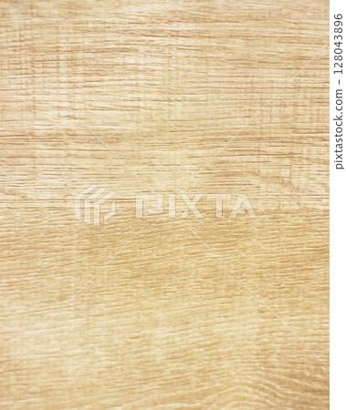 一塊老化木板的垂直背景圖像，木板呈淺棕色，邊緣略粗糙 128043896