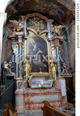 Altar of Saint Barbara in Barmherzigenkirche church in Graz, Styria, Austria 128044329