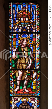 Saint John the Baptist, stained glass window in the Basilica di Santa Croce (Basilica of the Holy Cross) - famous Franciscan church in Florence, Italy 128044350