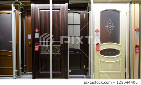Wooden front door timelapse stop motion from the interior of home with windows. Interior shot of Wooden Front Door 128044406