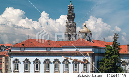 Episcopal Palace and Clerigos Church bell tower timelapse in Porto, Portugal. 128044439
