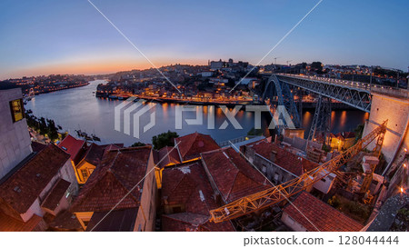 Panorama of old city Porto at river Duoro after sunset day to night timelapse, Oporto, Portugal 128044444