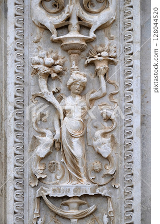 Relief on the portal of the Cathedral of Saint Lawrence in Lugano, Switzerland 128044520